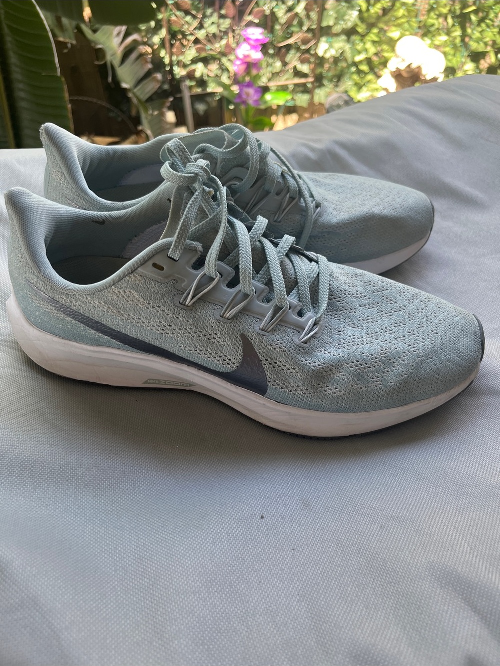 Nike Women’s Light Blue Knit Running Sneakers with Gray Swoosh